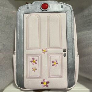 Loungefly- Pixar - Monsters Inc. - Boo’s Door Light Up Mini Backpack